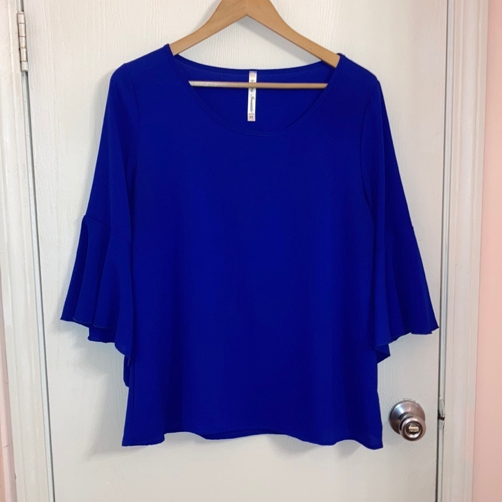 Simply Irresistible Royal blue top with large flutter sleeves